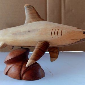 Handicrafts made of wood, original. With marine shark silhouettes. 2024